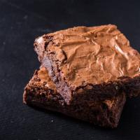 Fudge Brownie · Rich and moist fudge brownies each infused with a hint of creamy dark chocolate.