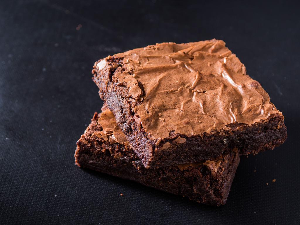 Fudge Brownie · Rich and moist fudge brownies each infused with a hint of creamy dark chocolate.