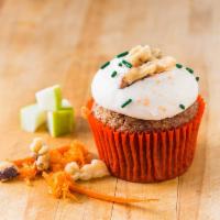 Spiced Carrot cupcake · Carrot cake with apples & walnuts topped with a spiced cream cheese. Definitely a top favori...
