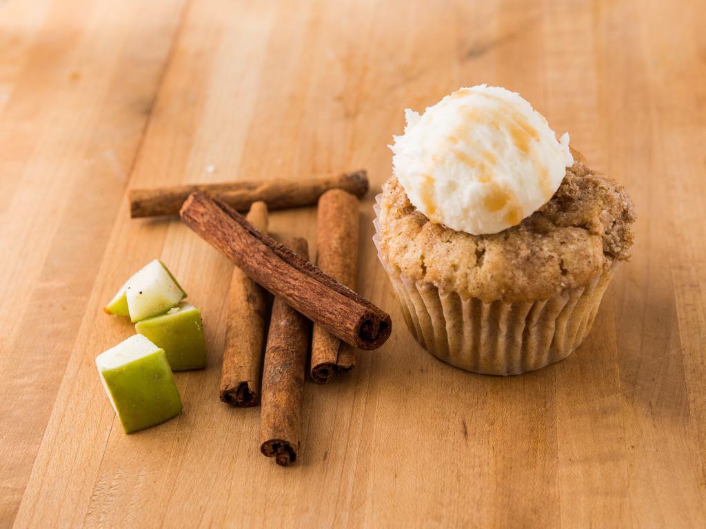 Apple pie a la mode** · Caramelized apple cinnamon struessel cake topped with a ice-cream scoop style vanilla buttercream.