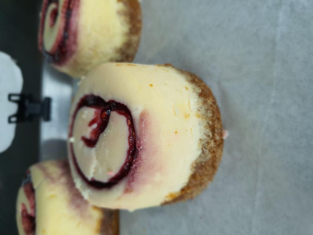 Raspberry Marzipan Cheesecake · Raspberry swirled Cheesecake made with Marzipan (almond paste)