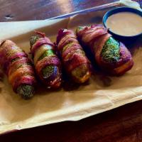 Bacon Wrapped Jalapeños · Wrapped in bacon 4 stuffed with cream cheese.
