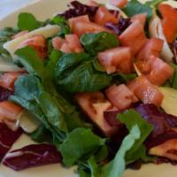 Tricolor Salad · Arugula, endives, radicchio, tomato, olive oil and oil and balsamic vinegar.