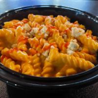 Buffalo Mac and Cheese · White mac and cheese, tossed with Buffalo sauce, topped with bleu cheese crumbles. Add chick...