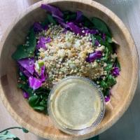 Asian Ginger Salad · Spinach, red cabbage, chickpea salad, buckwheat, sesame ginger dressing