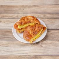 Croissant, Egg, Cheese and Meat Sandwich · 