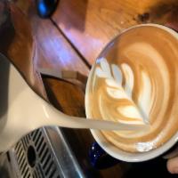 Dirty Chai Latte · Two shots of our house roasted espresso blended with a sweet and spiced chai syrup, topped w...