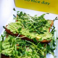 Avocado Toast · Smashed Avocado, olive oil, black pepper, salt and chili pepper flakes and pea shoots on top...