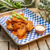 Chicken Wings · 8 pieces. Served with celery & carrot.