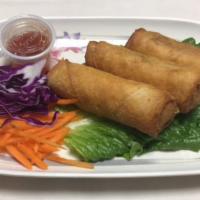 14. Vegetarian Spring Rolls · Crispy veggie roll filled with carrot, glass noodles, shiitake mushroom and cabbages. Served...