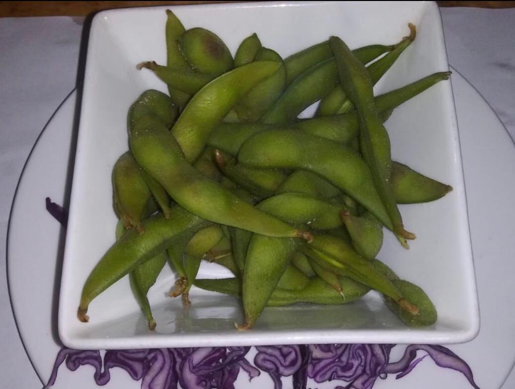 19. Edamame · Lightly salted and steamed green soybeans.