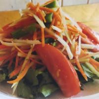 34. Som Tam Salad · Papaya salad. Thai stripped spice green papaya salad with string beans, tomatoes and crushed...