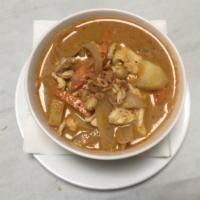 65. Massaman Curry · Potatoes, peanut, carrots, onions and coconut milk.