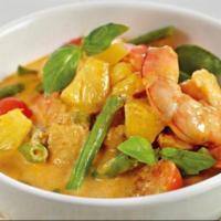 67. Pineapple Curry · Pineapple, basil, bell pepper, tomatoes and green peas in coconut curry. Spicy.