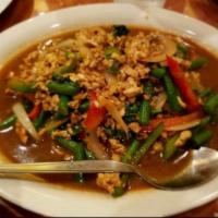 70. Thai Basil · Wok stir-fried with Thai basil, ground chicken, string beans, bamboo, chili, onion,  garlic ...