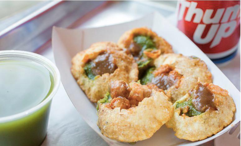Vegan Pani Puri · 6 pieces. Gujarati style puri filled with spiced potatoes and a spicy water mixture. Vegetarian. Pani and chutney packed seperately.