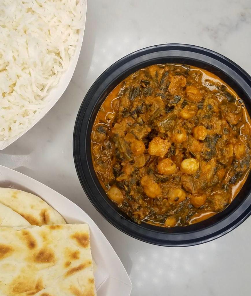Saag Channa Curry · Chopped spinach in a curried chickpea sauce.  Vegetarian and gluten free. 16oz curry. Comes with 16oz Basmati Rice.  Can be made Vegan.