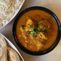 Chicken Kadhai Curry · Chicken cooked in a onion and tomato gravy. Gluten free. 16oz curry. Comes with 16oz Basmati...