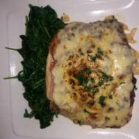 Pollo Valdostano  · Chicken breast topped w sliced ham and melted fontina cheese served w sautéed spinach.
Delic...