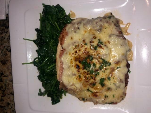 Pollo Valdostano  · Chicken breast topped w sliced ham and melted fontina cheese served w sautéed spinach.
Delicious!