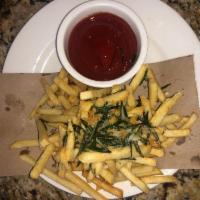 Truffle Fries · truffle oil, parmesan cheese and rosemary.