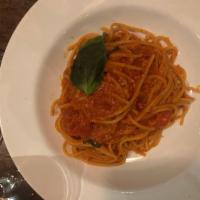 Spaghetti al Pomodoro  · fresh tomato sauce and basil