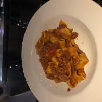 Pappardelle Beef Bolognese · Homemade fresh wide pasta in a slow cooked tomato & beef ragu.
Rich and delicious!