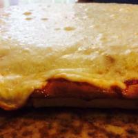 Sicilian Cheese Pizza · Twelve-slice square pie.