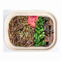 SOBA NOODLE SALAD · Savory Sesame Buckwheat/Whole Wheat Soba Noodles, Hearty Greens, Roasted Mushrooms, and Toas...