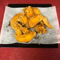 Fried Chicken Wing · Cooked wing of a chicken coated in sauce or seasoning.