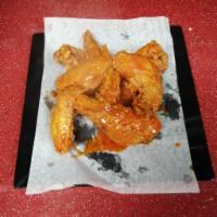 Buffalo Chicken Wing · Cooked wing of a chicken coated in sauce or seasoning.