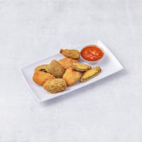Jalapeno Poppers · Stuffed with cheese and fried.