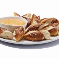 Beer Cheese ＆ Pretzels · Creamy cheese gets a shot of stout beer, and is served up with salted Bavarian pretzels. It’...