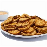 Hooters Original Fried Pickles · Yep, we take pickled pickles, fry ’em up to order and serve ’em up with a tangy dipping sauce.