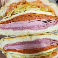 Italian Sandwich · Ham cappy, salami, pepperoni, provolone, lettuce, tomato, oil & vinegar.