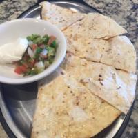 Wing It Chicken Quesadilla · Grilled chicken, Monterrey Jack Cheese, Tossed in Spicy Hawaiian Sauce. Served with Pico De ...