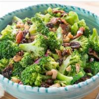 Bacon & Broccoli Salad · Fresh Broccoli, Red Grapes, Red Onions, & Bacon Bits smothered in a Red Wine Creamy Dressing
