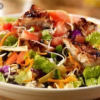 Grilled Chicken Salad · Bed of Greens, Grilled Chicken , bacon, cheese, tomato, with your choice of dressing