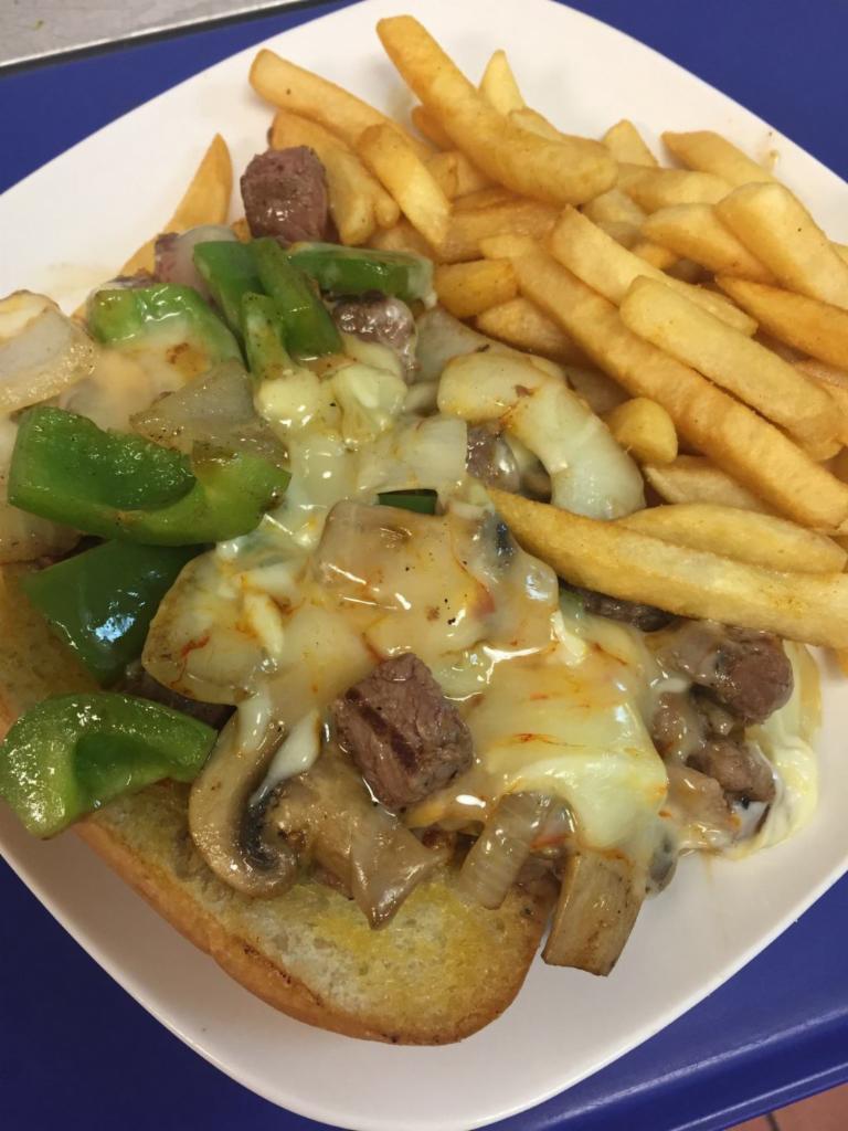 Steakinater Sandwich · Grilled Sirloin Steak, onions, bell peppers, & mushrooms, smothered in Monterrey Cheese, topped on Hoagie bun