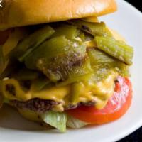 Green Chili Cheese Burger · Ground Chuck, topped with Monterrey Cheese, Green Chili, Lettuce, onions, & ranch