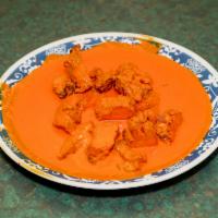 Chicken Tikka Masala · Boneless chicken, barbecued and cooked in thick yogurt sauce, blended with herbs and spices....