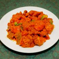 Chicken Chili · Cubes of chicken cooked in Indian Chinese style with peppers, onion, ginger and garlic. Serv...