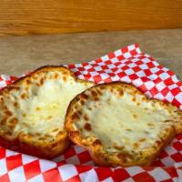 2 Slices Cheese Bread · Our tasty garlic bread topped with our three-cheese blend, oven baked just for you.