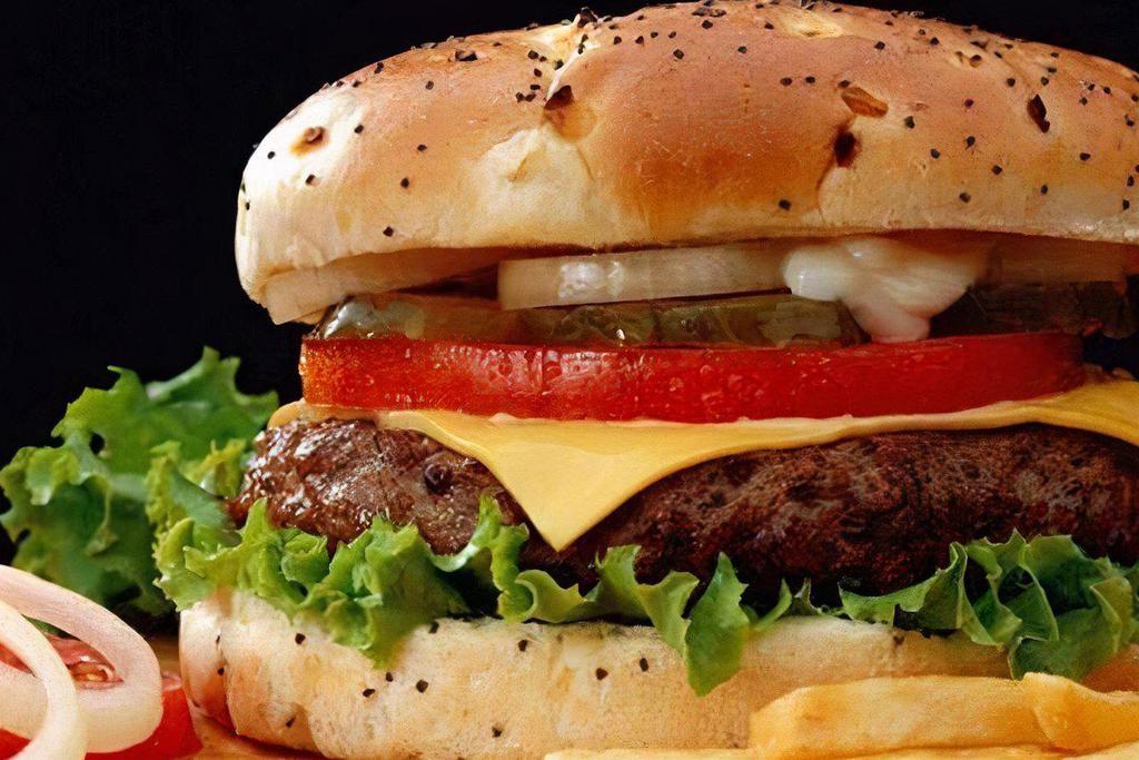 Cheese Burger (1/2 Pound) · 1/2 pound burger served with lettuce, tomatoes, onion, pickles, cheese, mayo, mustard, and ketchup.