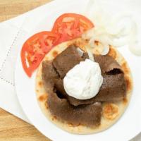 Gyro Plate  · Served with onion, tomato and gyro sauce , plate comes with double the meat !!!