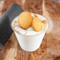 Banana Pudding · layers of sweet vanilla flavored custard, cookies and sliced fresh bananas topped with whipp...