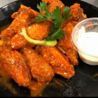 Buffalo Wings · Honey BBQ, mild, spicy, BBQ with blue cheese ranch dressing. 
