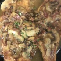 Chicken Marsala · Tender chicken breast sauteed with sensational mix of prosciutto and fresh sliced mushrooms ...
