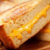 Classic Grilled Cheese Sandwich · Homemade White bread, American cheese, grilled to perfection.