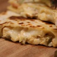 3-Cheese Quesadilla · Cheddar cheese, mozzarella cheese and Swiss cheese. Served with sour cream and salsa in your...